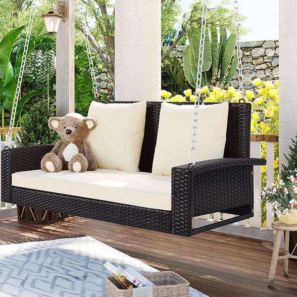 2-Person Wicker Hanging Porch Swing with Chains, Cushion, Pillow, Rattan Swing Bench for Garden, Backyard, Pond. (Brown Wicker, Beige Cushion)