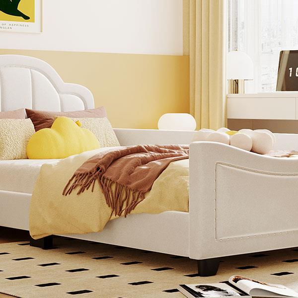 Twin Size Upholstered Daybed with Cloud Shaped Headboard, Embedded Elegant Copper Nail Design, Beige