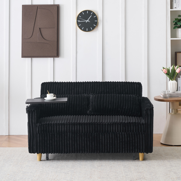 The pull-out and push-in black corduroy sofa with dual functions, equipped with a movable tabletop and USB ports, is suitable for use in living rooms and bedrooms.